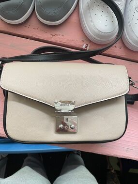 GUESS Cream Crossbody Bag with Black Trim and Silver Lock